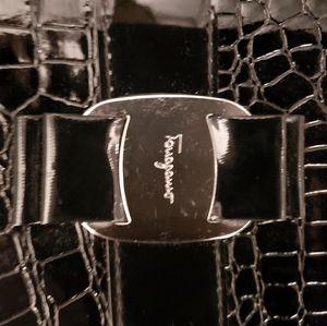 Ferragamo reptile skin like black patent handbag